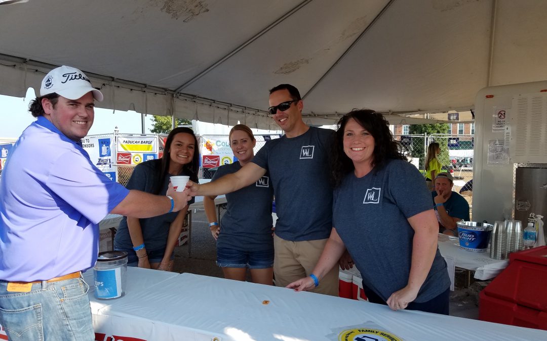 WWL Works Family Service Society Booth at BBQ on the River
