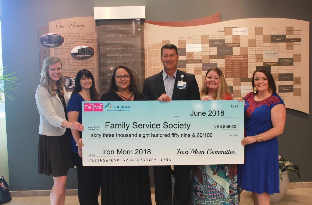 Kim Beanland Once Again Receives Check on Behalf of the Family Service Society